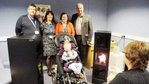 Audiology patient, Jeydan Fields, pictured with David Rogers (League Chair), Claire Rocket (Head of Audiology), Karen Fields (Jeydan’s mum), Philip White (League Secretary) and Sandy Aze (Assistant Audiologist)