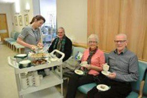 Patients and visitors on Torbay Hospital’s Ricky Grant Unit enjoying their afternoon treats