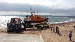 All-weather lifeboat Shannon class R and J Welburn launches on Exmouth Beach Photo Credit: Exmouth RNLI 