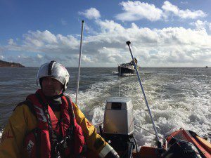 D class inshore lifeboat George Bearman towing the yacht to safety. (credit: Exmouth RNLI) 