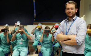 Nick Peres with classroom of medics