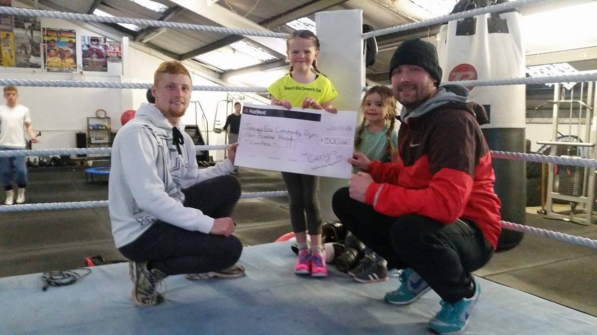 Bradley Head (coach), Cerys, Elika (Cerys' younger sister) and Gareth Hogg (former pro boxer and coach).