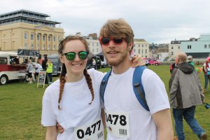 Libby Vanstone (left) who took part in The Colour Rush Teignmouth with Kai Radford (right)