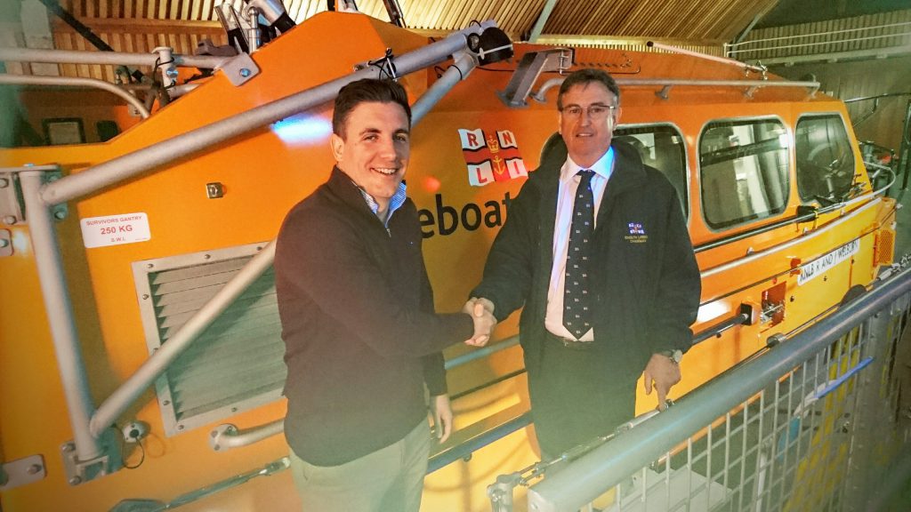 Photo: Exmouth RNLI Darryl Nicholas (left) succeeds Tim Baker (right) as Chair of the Exmouth Lifeboat Management Group. 