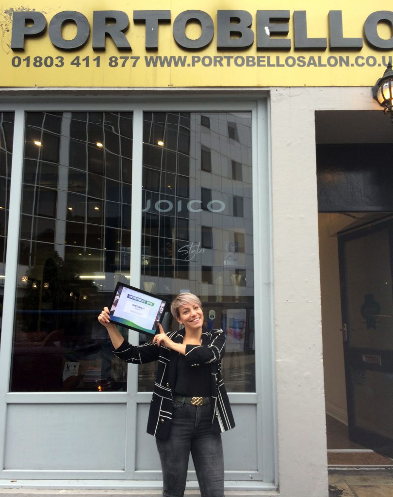  Melissa Hood from Torquay, proudly showing off her winner’s certificate outside Torquay’s Portobello Salon.